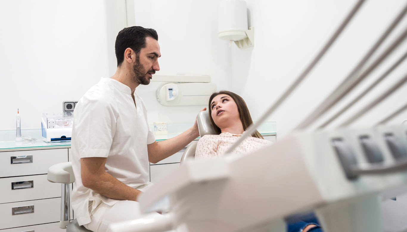 Dentist talking with a patient about preventive dental care in Emu Plains